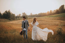 Load image into Gallery viewer, The Amazing lace &#39;Nomadic Dreamer&#39; wedding gown available in ivory or white all sizes and one of a kind so will vary in lace pattern